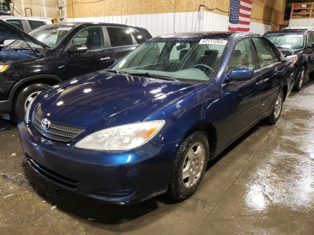 TOYOTA CAMRY LE 2002 with VIN 4T1BF32K92U509499 - Photo from auction