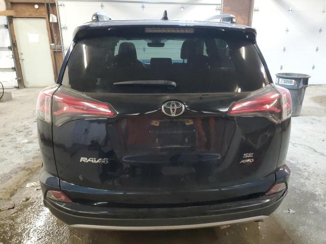 Photo 6 from auction – 2018 TOYOTA RAV4 SE with VIN JTMJFREV2JJ178967