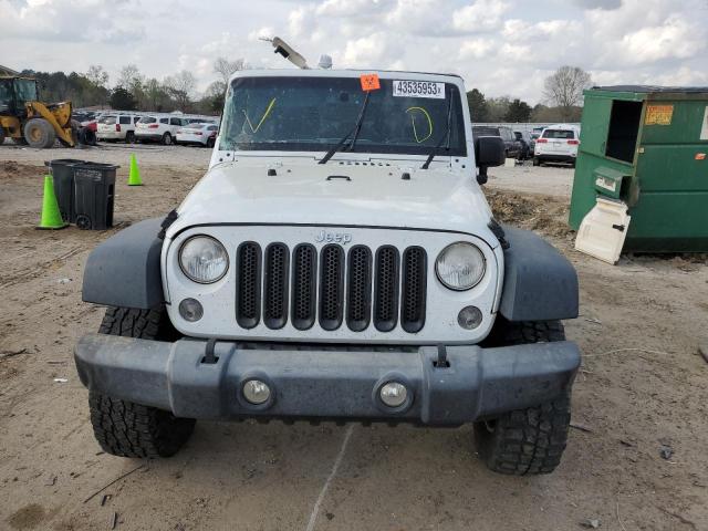 Photo 5 from auction – 2014 JEEP WRANGLER U with VIN 1C4BJWDG0EL313944