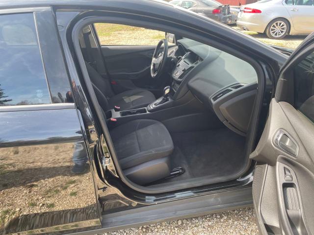 Photo 5 from auction – 2015 FORD FOCUS S with VIN 1FADP3E22FL370341