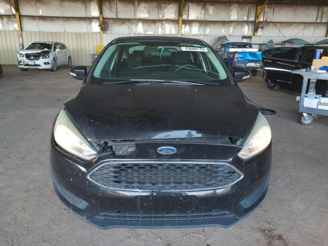 Photo 5 from auction – 2015 FORD FOCUS with VIN 1FADP3F2XFL329812