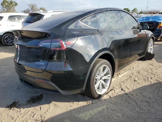 Photo 3 from auction – 2022 TESLA MODEL Y with VIN 7SAYGDEE7NF329381
