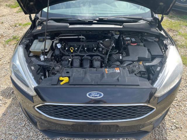 Photo 7 from auction – 2015 FORD FOCUS S with VIN 1FADP3E22FL370341