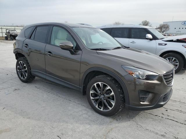 Photo 4 from auction – 2016 MAZDA CX-5 GT with VIN JM3KE2DY0G0663768