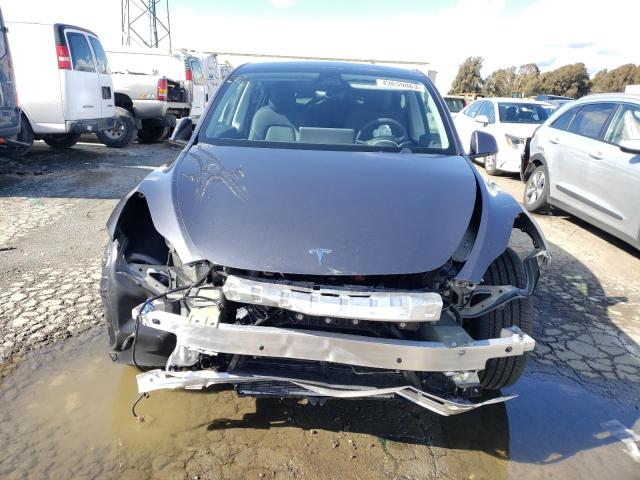 Photo 5 from auction – 2022 TESLA MODEL Y with VIN 7SAYGDEF5NF411375