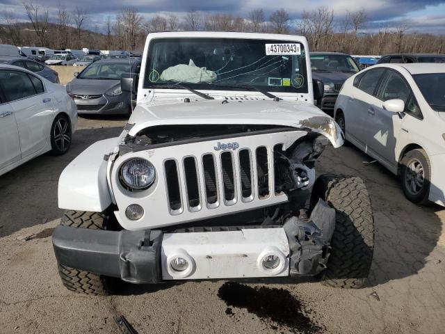 Photo 5 from auction – 2016 JEEP WRANGLER U with VIN 1C4BJWEG2GL272105