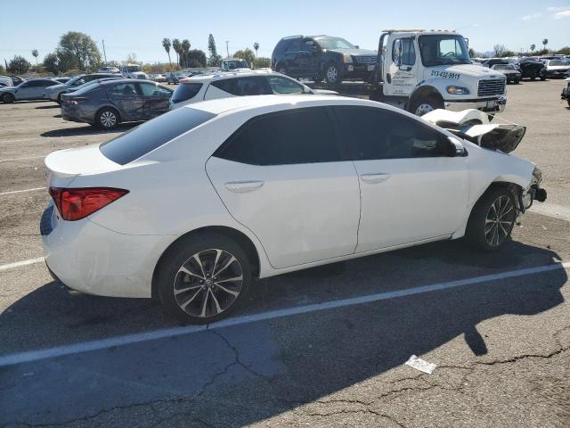 Photo 3 from auction – 2018 TOYOTA COROLLA L with VIN 5YFBURHE9JP748786