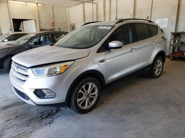 FORD ESCAPE SE 2018 with VIN 1FMCU9GD5JUA58013 - Photo from auction