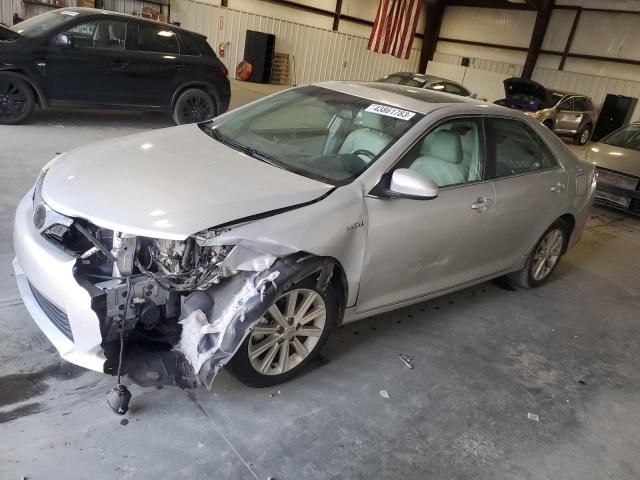 TOYOTA CAMRY HYBR 2012 with VIN 4T1BD1FK0CU048599 - Photo from auction