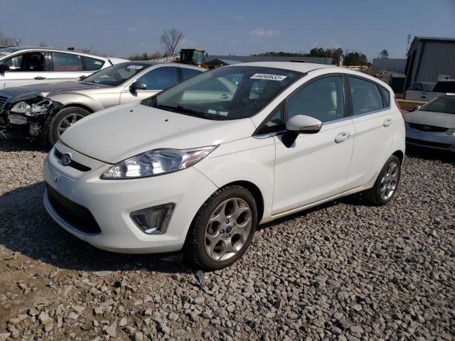 FORD FIESTA TIT 2013 with VIN 3FADP4FJ1DM113694 - Photo from auction