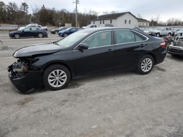 TOYOTA CAMRY LE 2017 with VIN 4T1BF1FK8HU636641 - Photo from auction