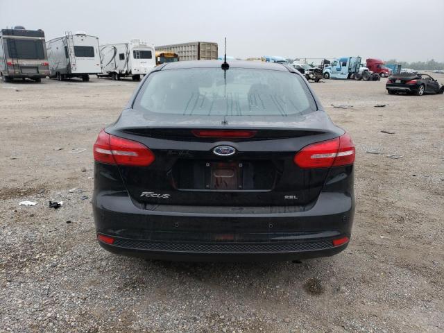 Photo 6 from auction – 2018 FORD FOCUS SEL with VIN 1FADP3H23JL244185