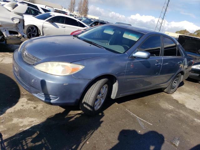 TOYOTA CAMRY LE 2002 with VIN JTDBF30K020010203 - Photo from auction