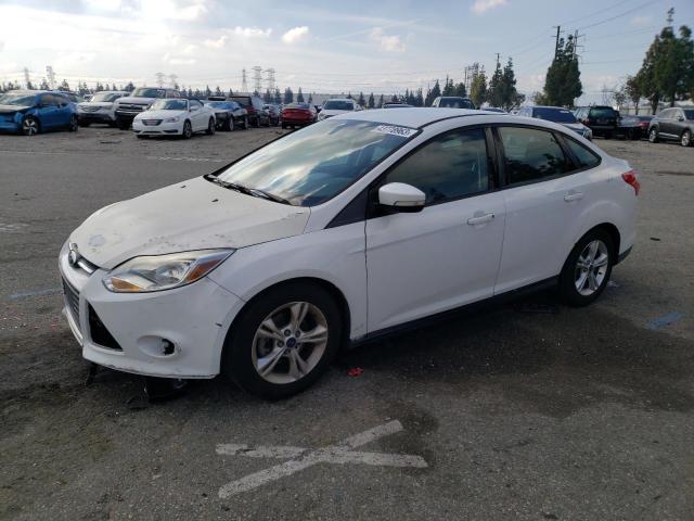 FORD FOCUS SE 2014 with VIN 1FADP3F21EL400331 - Photo from auction