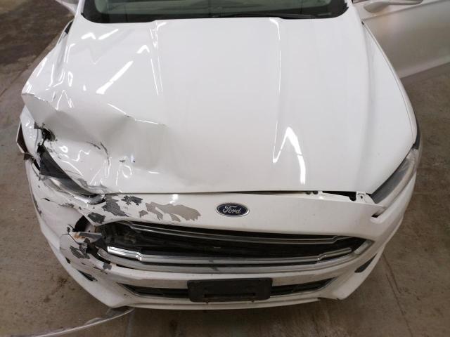 Photo 11 from auction – 2014 FORD FUSION TIT with VIN 3FA6P0K99ER130258