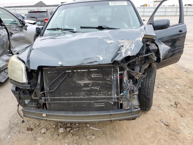 Photo 11 from auction – 2006 HONDA PILOT EX with VIN 5FNYF18616B006125