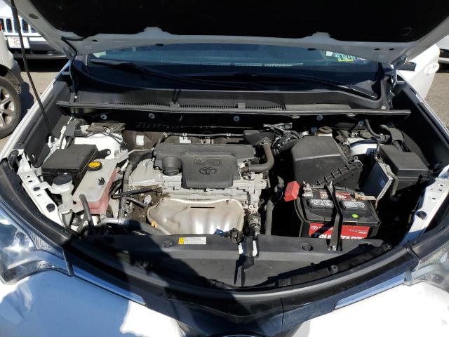 Photo 11 from auction – 2018 TOYOTA RAV4 LE with VIN 2T3BFREV5JW763273