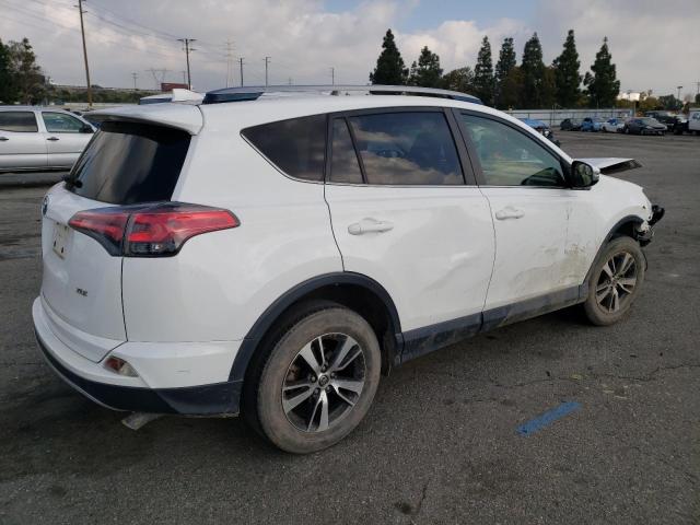 Photo 3 from auction – 2017 TOYOTA RAV4 XLE with VIN JTMWFREV2HJ703087
