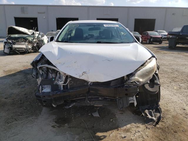 Photo 5 from auction – 2014 TOYOTA COROLLA L with VIN 2T1BURHE9EC004563