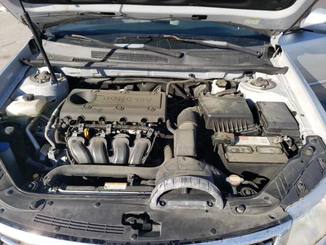 Photo 11 from auction – 2009 KIA OPTIMA LX with VIN KNAGE228595317980
