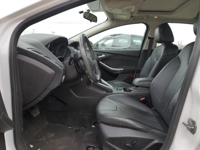 Foto 7 de la subasta – 2013 FORD FOCUS SE con VIN 1FADP3F20DL371449