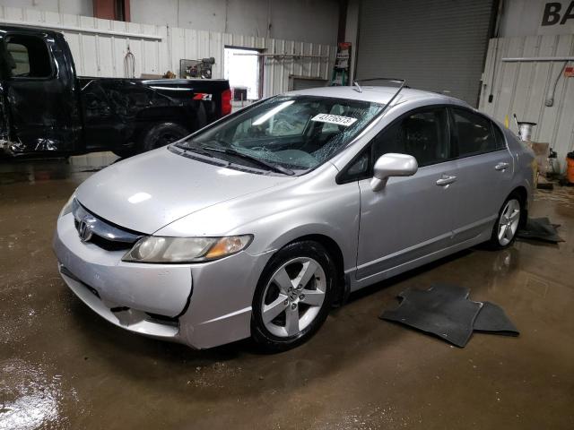 HONDA CIVIC LX-S 2010 with VIN 19XFA1F67AE019453 - Photo from auction