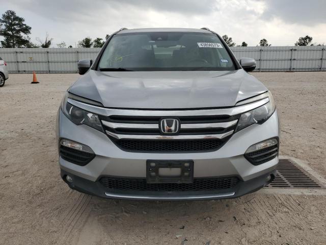 Photo 5 from auction – 2017 HONDA PILOT TOUR with VIN 5FNYF5H95HB028584