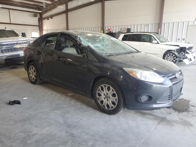 Foto 4 de la subasta – 2013 FORD FOCUS SE con VIN 1FADP3F20DL174605