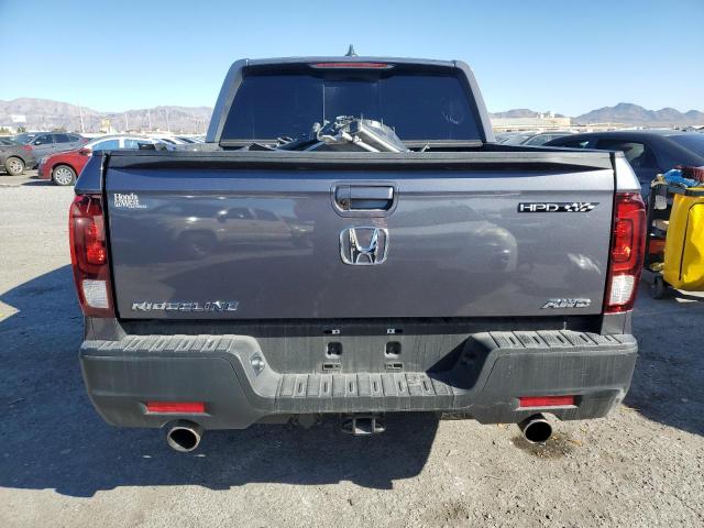 Photo 6 from auction – 2022 HONDA RIDGELINE with VIN 5FPYK3F52NB000857