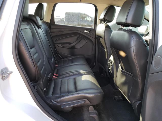 Photo 11 from auction – 2017 FORD ESCAPE TIT with VIN 1FMCU0J90HUE91216