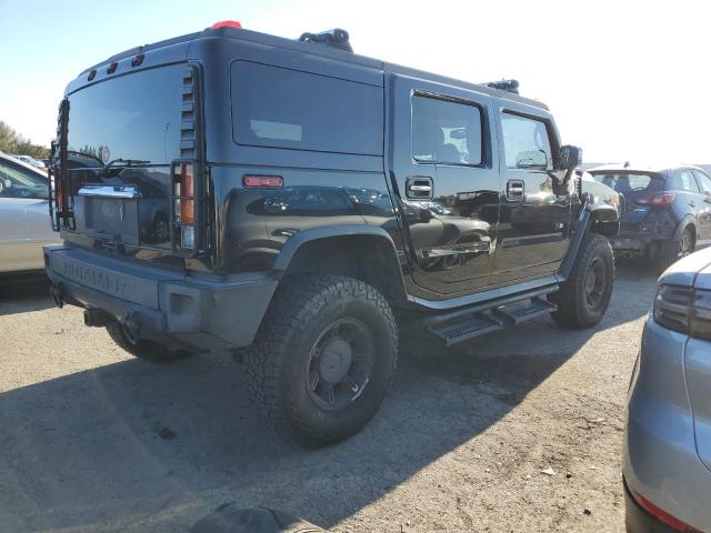Photo 3 from auction – 2003 HUMMER H2 with VIN 5GRGN23U23H135821