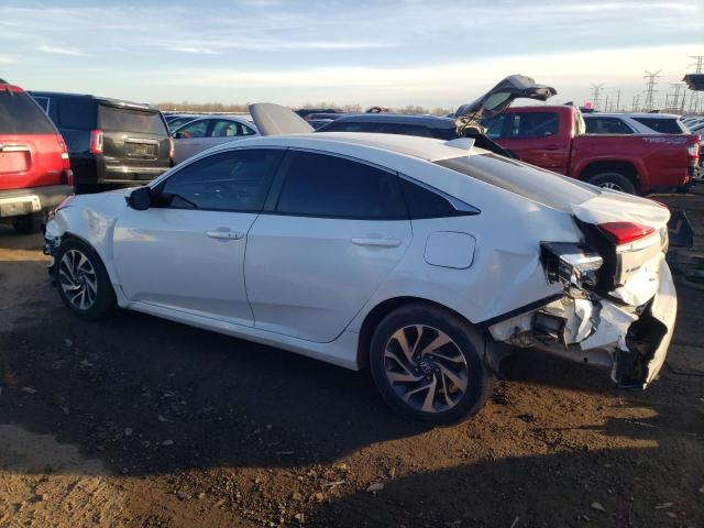 Photo 2 from auction – 2018 HONDA CIVIC EX with VIN 19XFC2F77JE028596