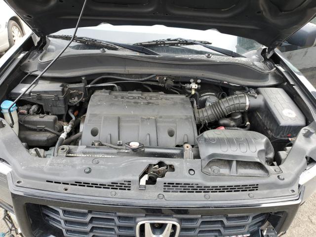Photo 11 from auction – 2012 HONDA RIDGELINE with VIN 5FPYK1F76CB001996