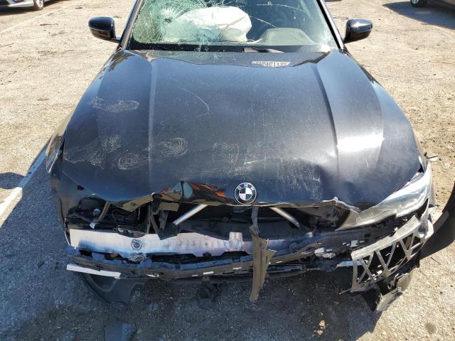 Photo 11 from auction – 2021 BMW 330I with VIN 3MW5R1J00M8C14902