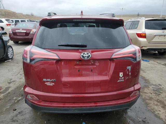 Photo 6 from auction – 2018 TOYOTA RAV4 LE with VIN JTMBFREV9JD229383