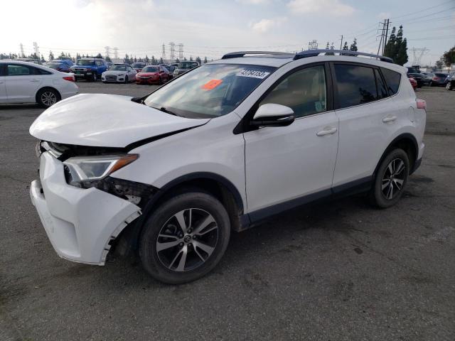 Photo 1 from auction – 2017 TOYOTA RAV4 XLE with VIN JTMWFREV2HJ703087