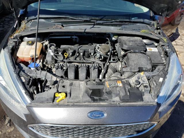 Photo 11 from auction – 2015 FORD FOCUS SE with VIN 1FADP3F20FL340267
