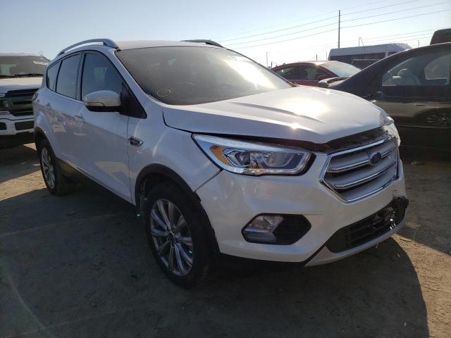 Photo 4 from auction – 2017 FORD ESCAPE TIT with VIN 1FMCU0J90HUE91216