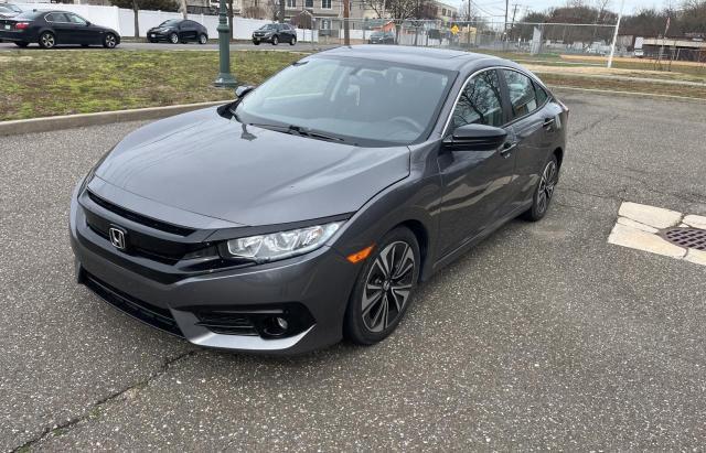 Photo 2 from auction – 2016 HONDA CIVIC EX with VIN 2HGFC1F30GH647174