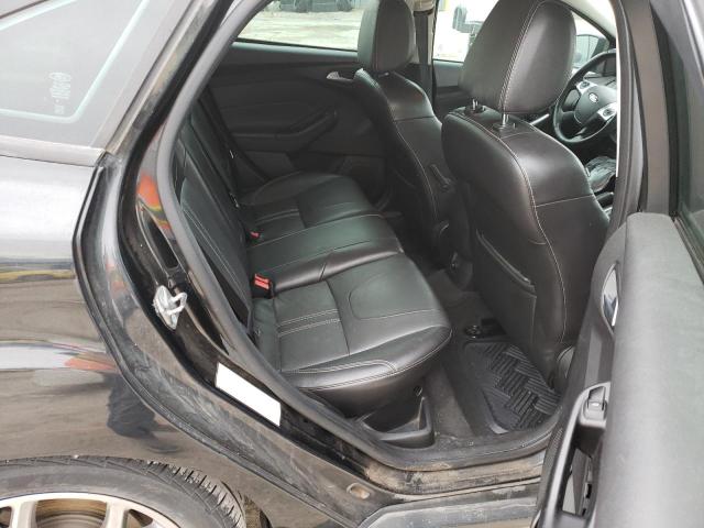 Photo 10 from auction – 2014 FORD FOCUS SE with VIN 1FADP3F2XEL325483