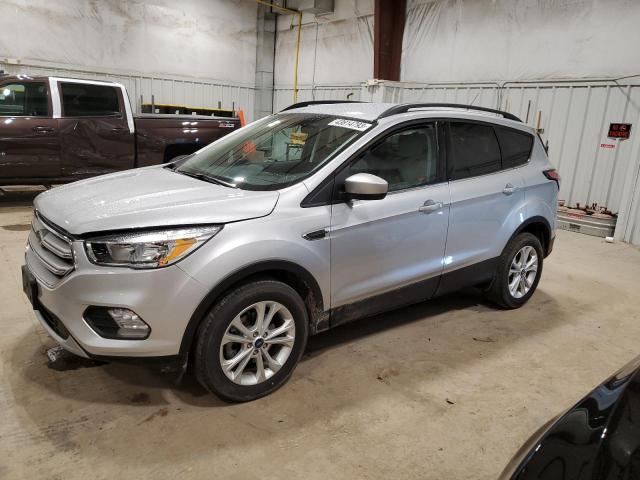 FORD ESCAPE SE 2018 with VIN 1FMCU0GD9JUC70733 - Photo from auction