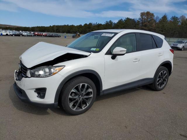 MAZDA CX-5 GT 2016 with VIN JM3KE4DY4G0729945 - Photo from auction