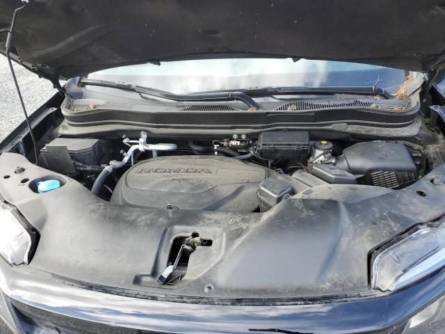 Photo 11 from auction – 2021 HONDA PILOT SE with VIN 5FNYF6H25MB029673
