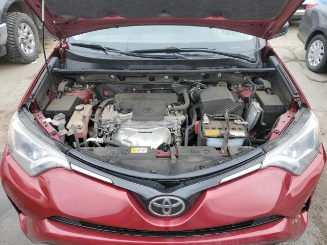 Photo 12 from auction – 2018 TOYOTA RAV4 LE with VIN JTMBFREV9JD229383