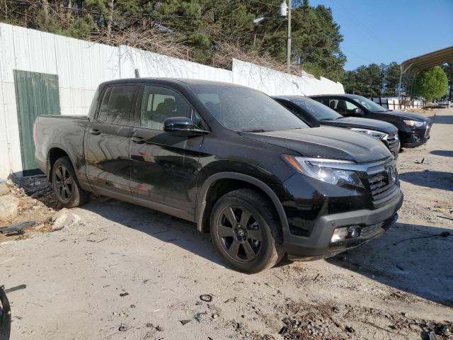 Photo 4 from auction – 2020 HONDA RIDGELINE with VIN 5FPYK3F83LB025130