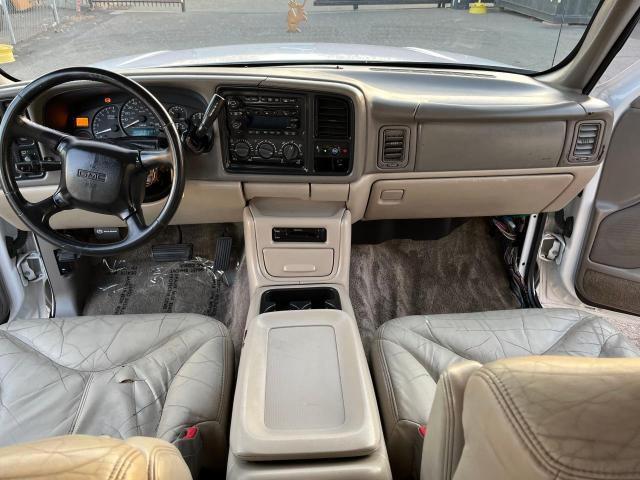 Photo 9 from auction – 2002 GMC YUKON with VIN 1GKEC13T42R273065