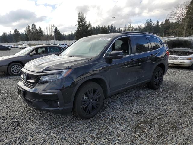 HONDA PILOT SE 2021 with VIN 5FNYF6H25MB029673 - Photo from auction