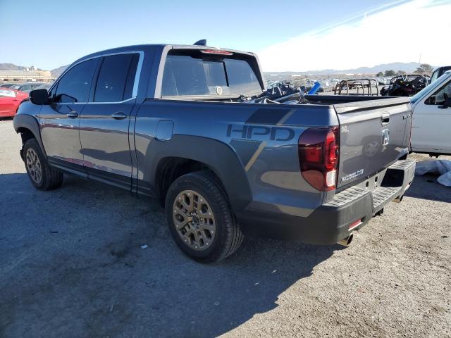 Photo 2 from auction – 2022 HONDA RIDGELINE with VIN 5FPYK3F52NB000857