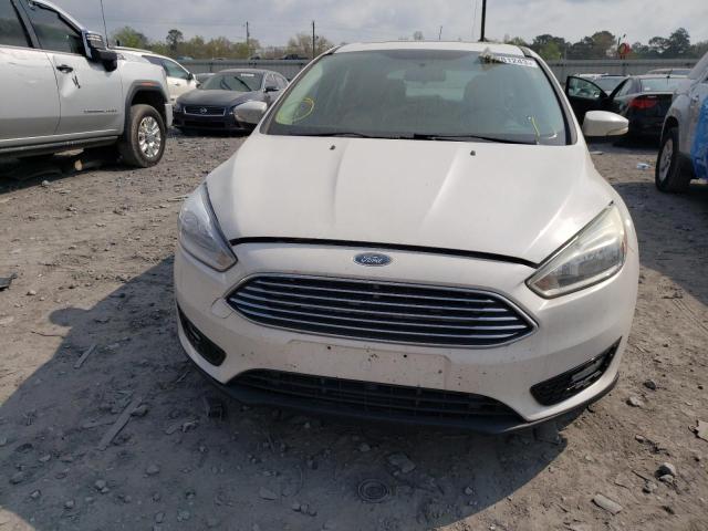 Photo 5 from auction – 2015 FORD FOCUS TITA with VIN 1FADP3N23FL227625