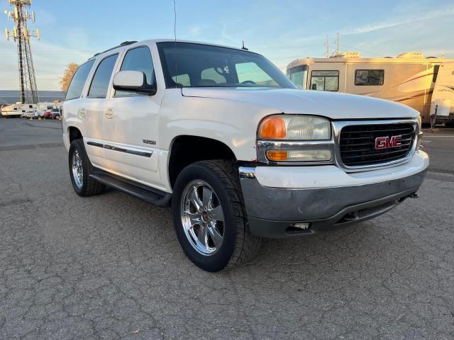 GMC YUKON 2002 with VIN 1GKEC13T42R273065 - Photo from auction